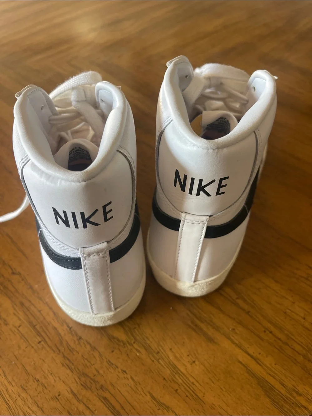 Nike Size 8 White High-Top Sneakers with Black Swoosh